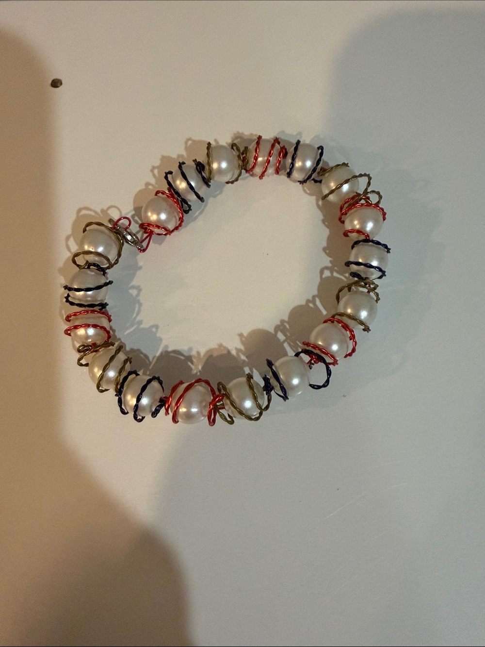 Pearl Bead Bracelet with Red, Navy and Gold Wire of unknown brand